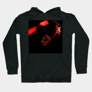 Digital collage and special processing. Dark, scary place in woods. Hole. Red and orange. Hoodie